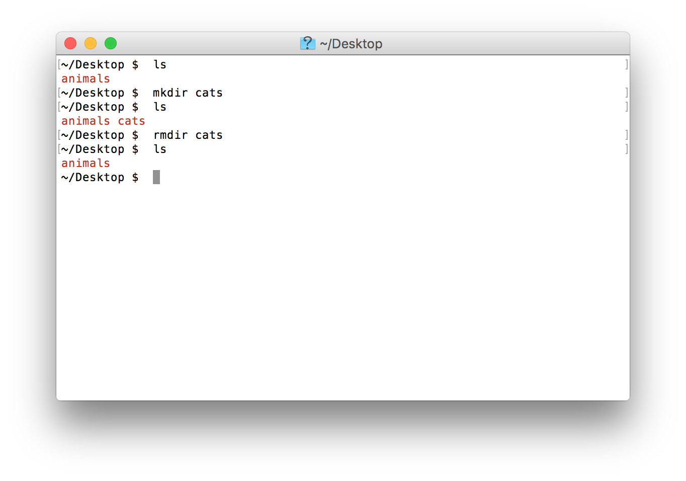 Using `rmdir` to remove an **empty** directory.